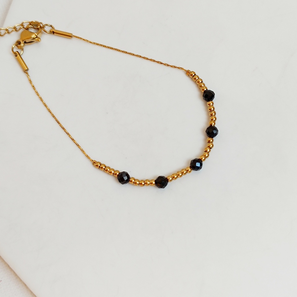 Pulsera Cuentas Negras Dorada