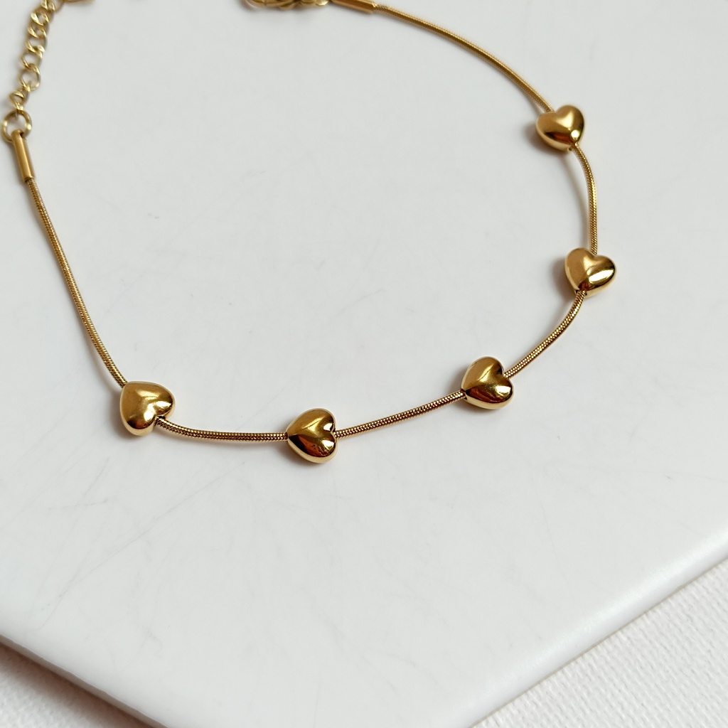 Pulsera Corazones 3D Dorado